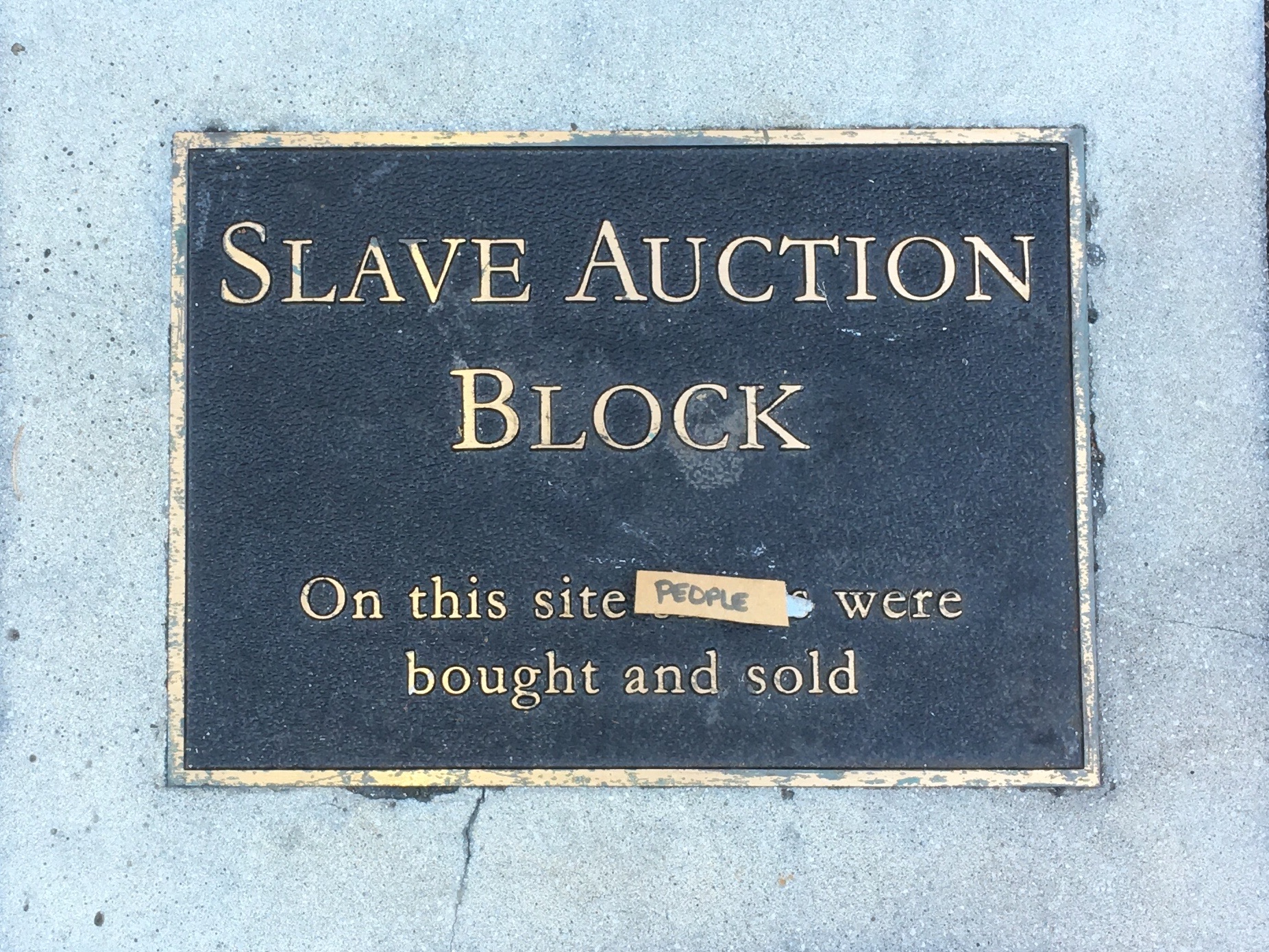 Arrest made in connection to missing Court Square slave auction plaque